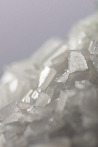 Macro texture shot of Magnesium Mineral Spa Flakes 
